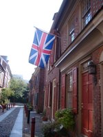 A Loyalist flag hanging from an 18th century refurbished house in Elfreth's Alley in the Old City. Second St. 
and the tavern was just around the corner, according to a newspaper ad from the period.