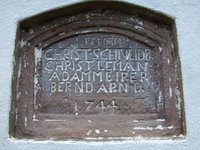 The plaque in the wall of the present Old Goshenhoppen Reformed Church U.C.C. at Woxall, Montgomery Co. PA. The 1744 plaque represents the Reformed congregation of the 1744 church, including that of Christian Schneider. 2005.