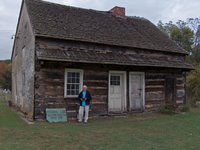 Original log meeting house [Gemeinhaus], Old Goshenhoppen at Woxall, and the author.